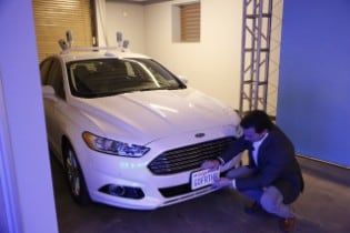 Ford President and CEO Mark Fields with the Autonomous Fu...